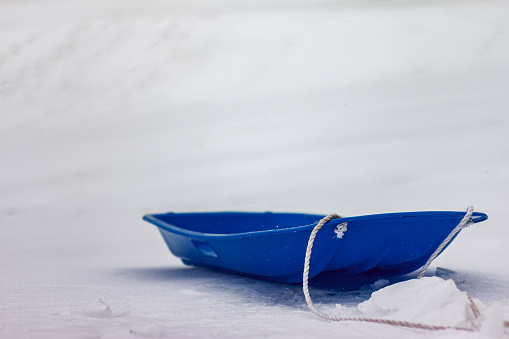 Photo of sled on snow in color in Troy, New York, United States