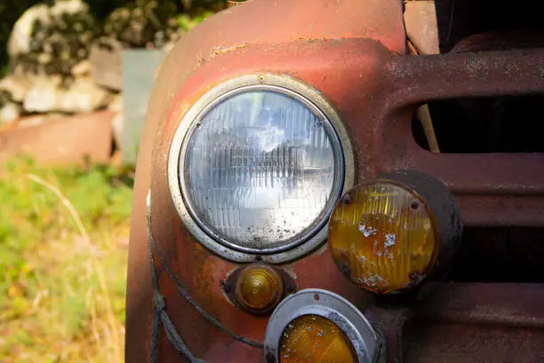 Headlights of old Studebaker car in Adirondack, New York, United States