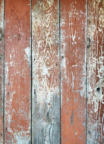Old wooden wall with paint, close up