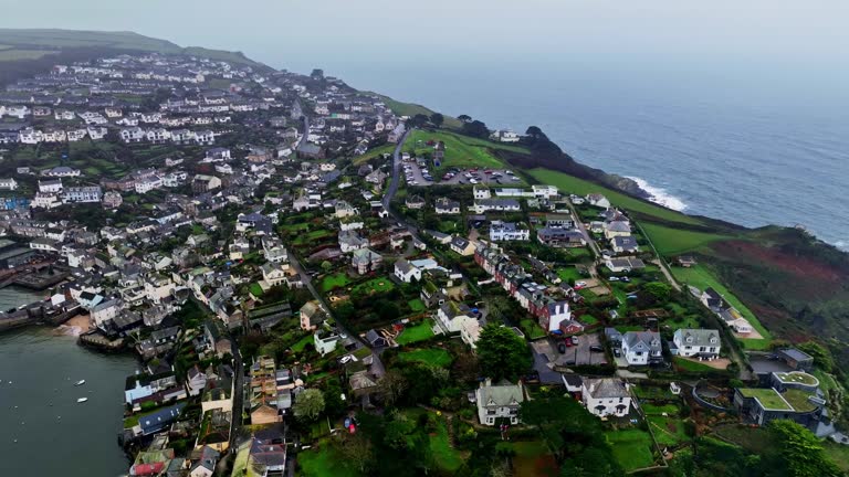 Flying above the quaint historic village of Polruan in Cornwall England