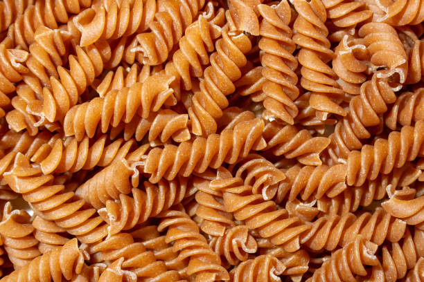 istock Uncooked Whole Grain Fusilli Pasta Background 1921171169