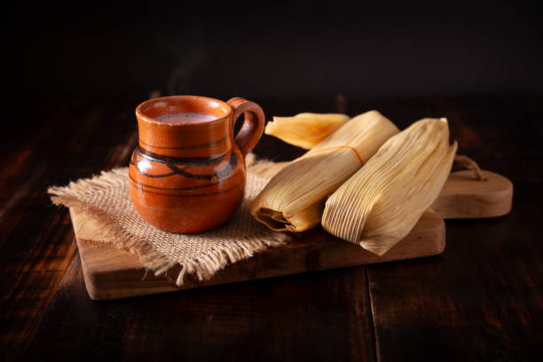 Atole and Tamales on dark background mexican food