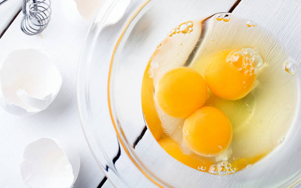 istock Egg yolks in a glass bowl on table 1921199806