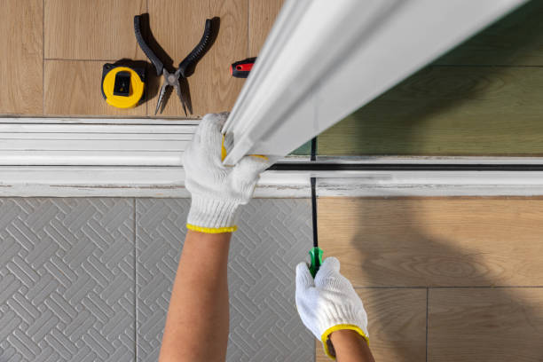 istock Worker fixing derailed roller of sliding door. Replace Sliding Glass Door Rollers concept 1921201082