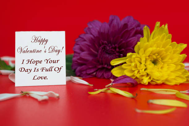 istock Valentine's Day Greeting Card with flowers on red background. 1921241917