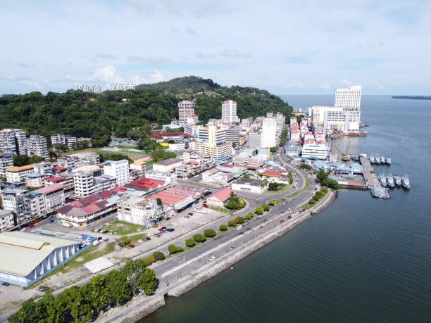 sandakan is also the second largest town in sabah, malaysia. known as the natural city, sandakan visitors have the opportunity to explore wildlife sanctuaries and discovery centers. - sanctuaries foto e immagini stock