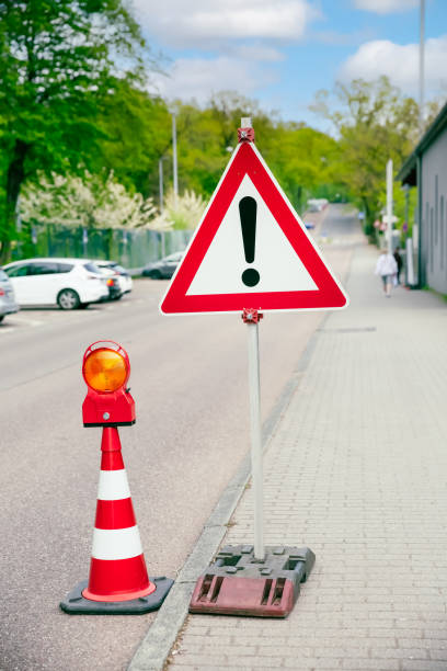 Red and white traffic triangle with a exclamation mark inside