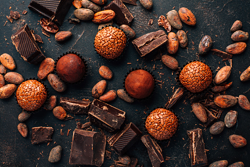 Homemade sweetmeats with chocolate bars and cocoa beans