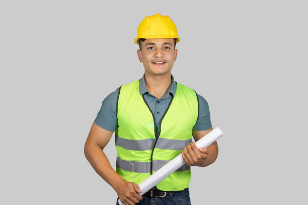 istock An Asian Happy Construction Worker Engineer giving expression gestures with chartpaper and notebook 1921397469