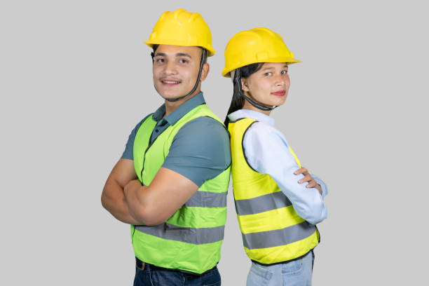 アジアのカップルエンジニアと建築家は、建設現場でジェスチャーと表情を与える - construction worker manual worker construction group of people ストックフォトと画像