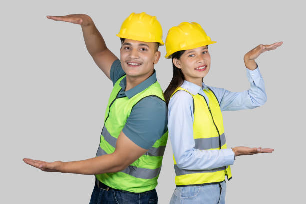 asian couple engineer and architect giving gestures and expressions on construction field - construction worker manual worker construction group of people ストックフォトと画像