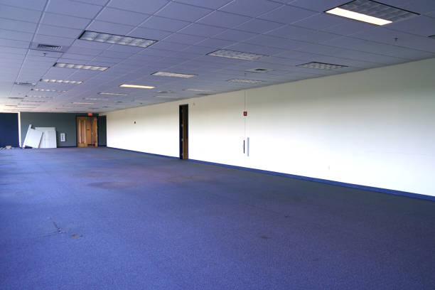 istock empty office building interior with furniture removed before renovation 1921452151