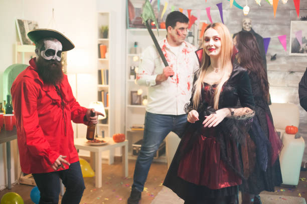 istock Shy blond woman dressed up like a vampire 1921476332