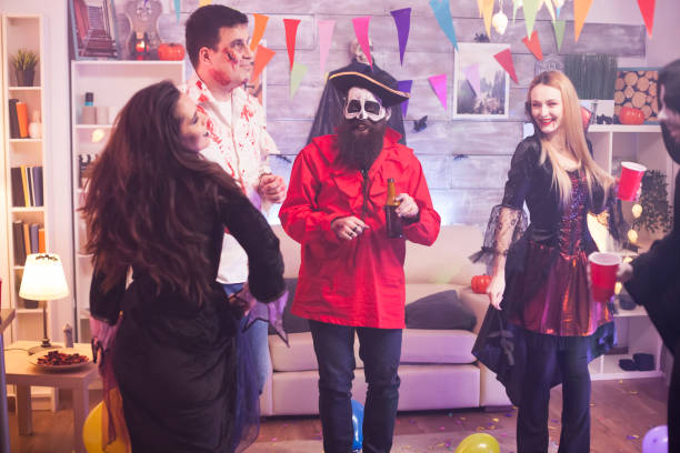 istock Cheerful young woman dressed up like a vampire 1921522852