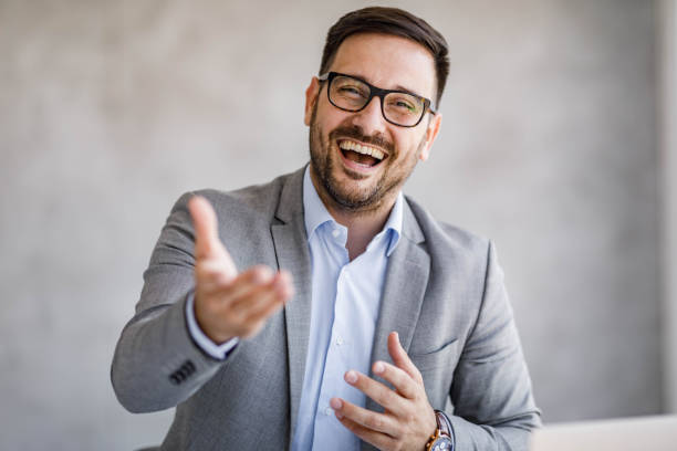 istock Young happy entrepreneur having a conference call. 1921536458
