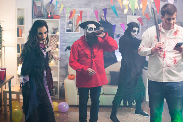 istock Man dressed up like a zombie with an axe 1921553862