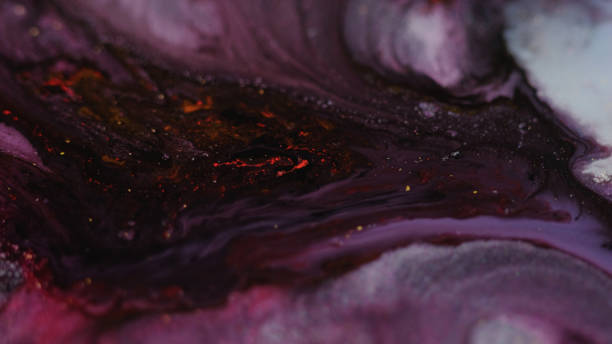 istock Ink fluid wave paint water flow purple dye spill 1921555961