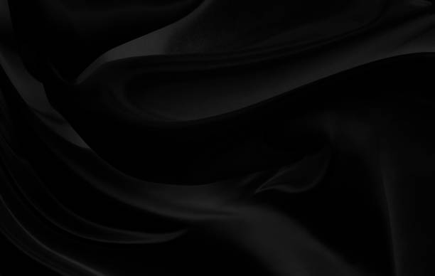 istock Black gray satin dark fabric texture luxurious shiny that is abstract silk cloth background with patterns soft waves blur beautiful. 1921559138