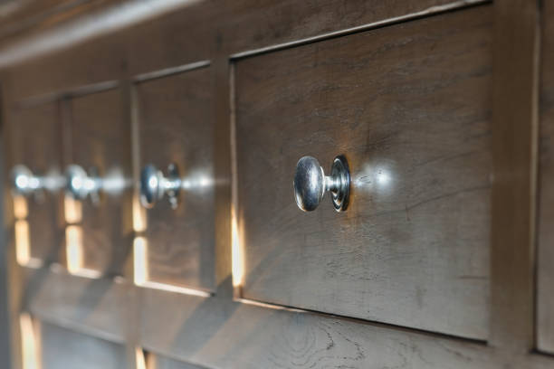 istock Drawer knob on a light oak cabinet, perspective view 1921562318