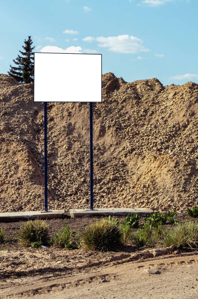 istock Reconstruction of a building with an empty billboard 1921628741