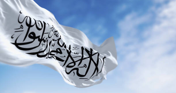 islamic emirate of afghanistan flag waving in the wind - flag of jihad zdjęcia i obrazy z banku zdjęć