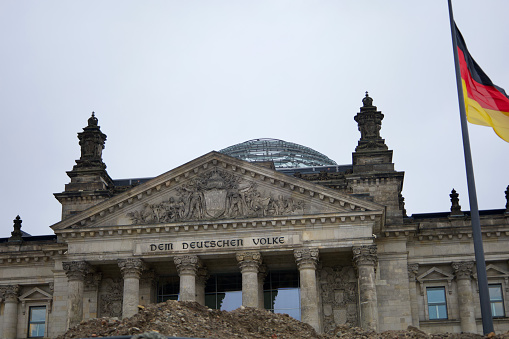 Berlin, Germany, January 03, 2024, German Flag on rooftop of Bundestag.