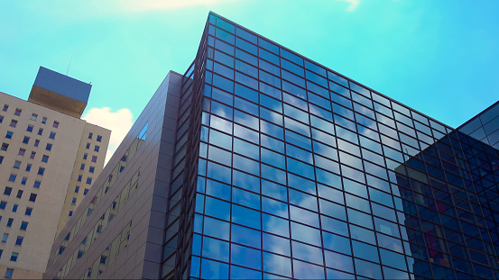 Office building on the blue sky background