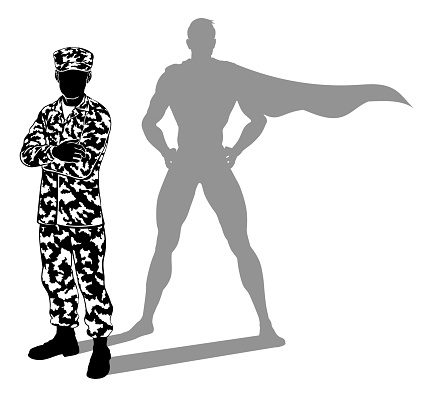 A super hero military army soldier man in silhouette. Revealed to be a superhero by his shadow.