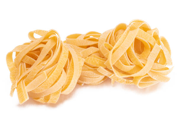istock Three Classic Italian Raw Egg Fettuccine - Isolated on White Background 1921761699