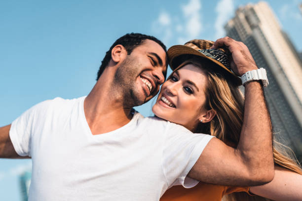 istock couple together at the beach in Dubai 1921765981
