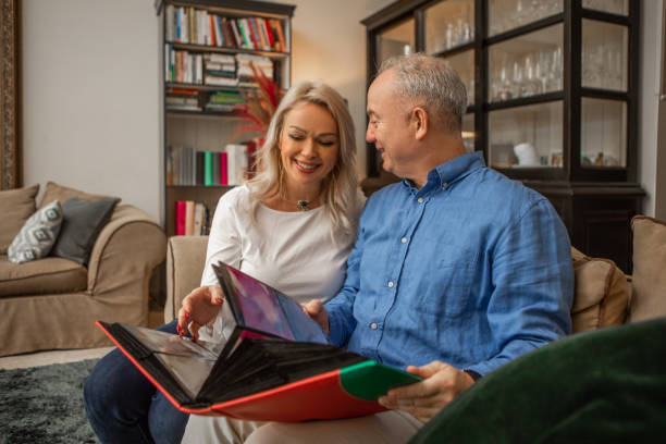 istock Married couple relaxing at home on the sofa 1921768177