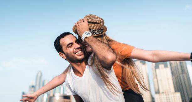 istock couple together at the beach in Dubai 1921768769