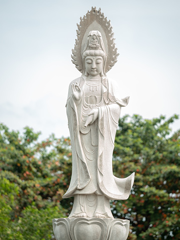 Statue of standing Guanyin or Goddess of Mercy.