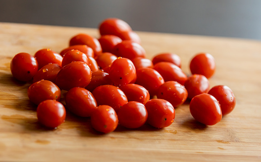 Fresh Organic Cherry Tomatoes on Wooden Board - Vibrant Farm-to-Table Delight