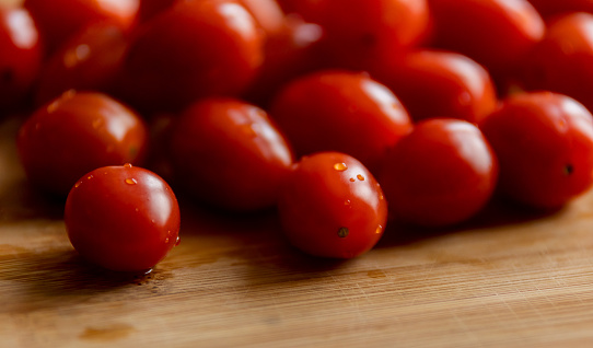 Fresh Organic Cherry Tomatoes on Wooden Board - Vibrant Farm-to-Table Delight