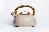 Kettle with handle isolated on white studio background.