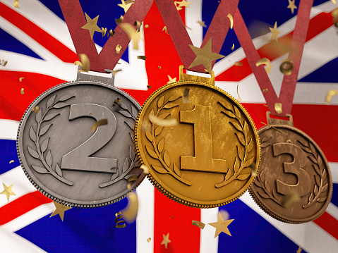 2024 Summer Games Sports Competition Medals over British Flag. 3D Render