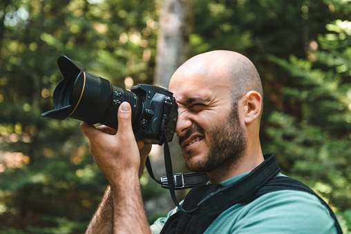 wildlife photographer in the wood