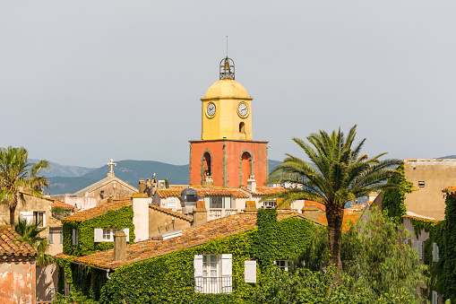 Scenic view of old clock tower in Saint Tropez in south of France in summer colors