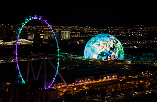 Las Vegas, Nevada, USA - November 7th, 2023:  MSG Sphere and High Roller in Las Vegas illuminated at night