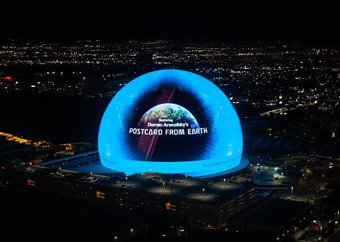 Las Vegas, Nevada, USA - November 7th, 2023: MSG Sphere in Las Vegas showing advertisement for Postcard from Earth movie