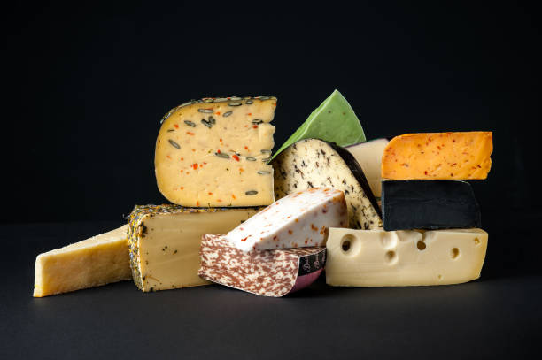 istock Cheeses Delicate cheeses. Colored cheese. Italian delicacies 1922048028