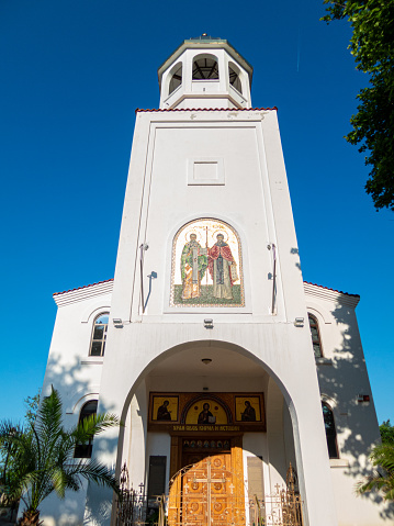 White bell tower of church