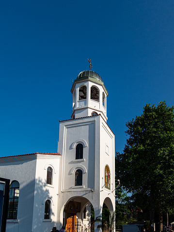 White bell tower of church