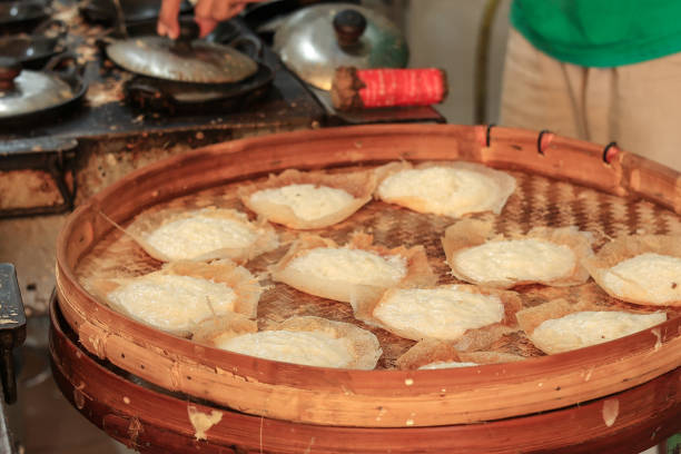 Fresh Made Serabi Notosuman, Javanese Traditional Pancake. On Bamboo Tray