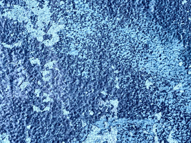 istock Background from an old coat of blue paint peeling off a wall 1922075145