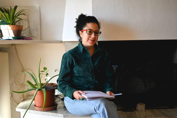 istock Multiracial woman psychologist working at home. 1922101947
