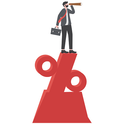 Businessman looking through telescope standing on top of percentage sign. Concept business marketing