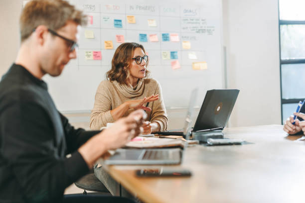 istock Business professionals collaborating in a productive office meeting 1922115804