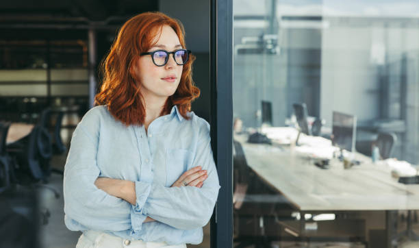 istock Confident businesswoman in office, thinking about work 1922120095